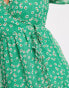 Фото #3 товара In The Style Plus x Jac Jossa frilly trim wrap tea dress in green daisy print