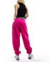 Фото #10 товара Nike mini swoosh oversized fleece joggers in fierce pink