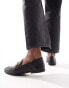 Accessorize snaffle loafers in black