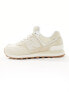 New Balance 574 trainers with gum sole in beige