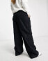 Фото #2 товара ASOS DESIGN Curve oversized cargo trouser with multi pocket in black