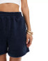 ASOS DESIGN fleece shorts in navy