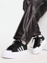 adidas Originals Nizza platform trainers in black/white