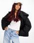 Фото #1 товара ASOS DESIGN mid length puffer coat with hood in black