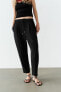 Flowing cropped trousers