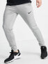 Фото #4 товара Nike Training Dri-FIT tapered joggers in light grey