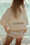 Cropped slogan sweatshirt