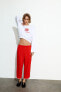 Cropped trousers with side stripe