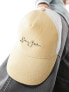 Sean John script logo baseball trucker cap in beige and white