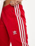 adidas Originals SST track pants in red