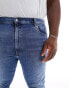 Фото #10 товара Levi's Big & Tall 512 slim taper jeans in mid blue