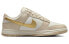 Nike Dunk Low "Gold Swoosh" DX5930-001 Sneakers