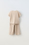 Waffle-knit t-shirt and trousers co-ord