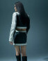 Фото #6 товара Murci leather look mini skirt co-ord in black with cream trim