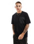 Фото #1 товара Jack & Jones oversized t-shirt with nylon pocket in black