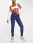 Фото #4 товара Calvin Klein Jeans high rise skinny jeans in mid wash