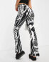 River Island abstract wing print flare trouser in cream