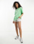 Фото #3 товара ASOS DESIGN oversized t-shirt with wellbeing puff print in green