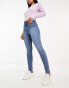 Фото #2 товара New Look lift and shape skinny jeans in mid blue