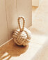 Plaited doorstop