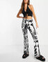 River Island abstract wing print flare trouser in cream