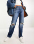 Фото #1 товара Levi's low rise ripped knee jeans in mid blue