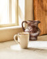 Фото #21 товара Porcelain mug with antique finish rim