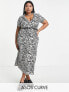 ASOS DESIGN Curve short sleeve midi wrap dress with belt in mono zebra print