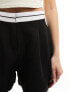 In The Style contrast waistband shorts in black