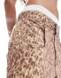 Фото #2 товара Reclaimed Vintage unisex western leopard print longer length jorts