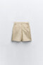 High-waist pleated bermuda shorts