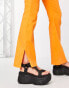 Фото #3 товара ASOS DESIGN hipster bengaline flare trousers in pop orange