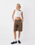 Фото #1 товара Bershka baggy longline shorts in leopard print