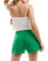 Фото #2 товара Converse Retro Chuck jersey knit shorts in green