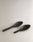 Set of stoneware spoons with raised detail (set of 2)