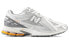 Фото #2 товара Кроссовки New Balance NB 1906R бело-серые мужские