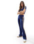 Фото #2 товара adidas Originals ribbed flared leggings in dark blue