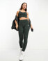 New Balance Linear Heritage high waisted leggings in washed black