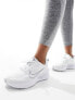 Nike Running Interact Run trainers in white and silver