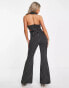 ASOS DESIGN tux halter cut out belted jumpsuit with flare leg in black pinstripe