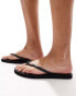 Reef Seaside flipflops in black and white