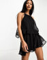 Фото #1 товара River Island – Gestufter Playsuit aus leicht genopptem Jacquard in Schwarz