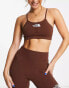 The North Face Training seamless performance sports bra in brown Exclusive at ASOS