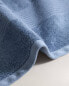 Cotton bordered bath towel