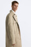 Double-breasted technical trench coat