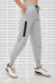 Фото #1 товара Брюки спортивные женские Nike Tech Fleece Loose Fit серого цвета