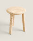 Round travertine mini side table