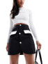 Фото #7 товара In The Style exclusive tailored contrast pocket button through mini skirt co-ord in black