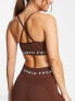 Фото #2 товара The North Face Training seamless performance sports bra in brown Exclusive at ASOS