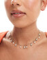 Фото #1 товара ASOS DESIGN short necklace with faux freshwater pearl and shell design in gold tone